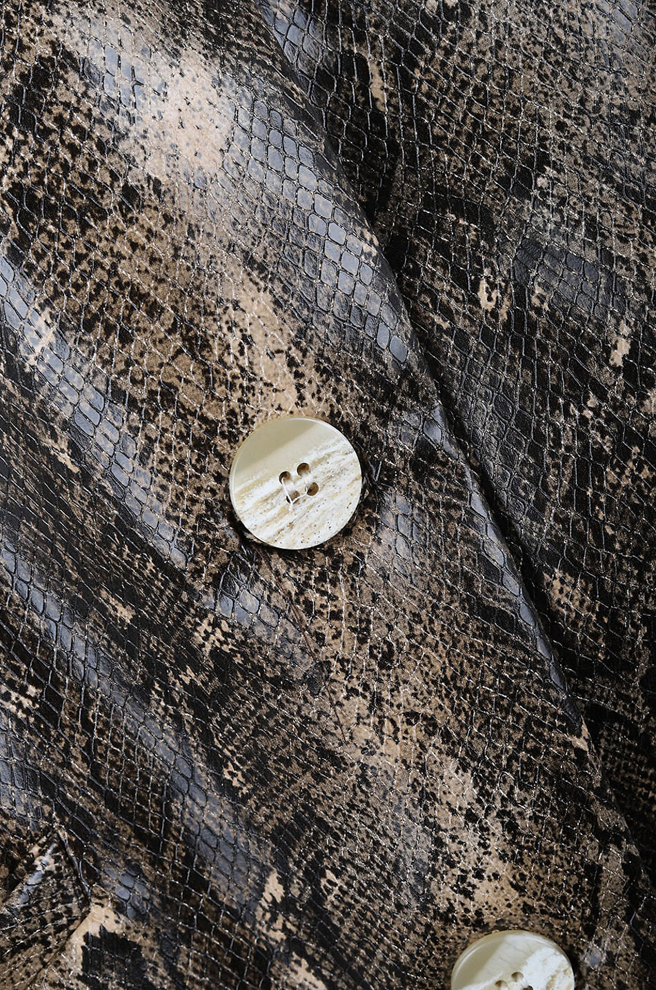 Blazer en cuir synthétique imprimé python