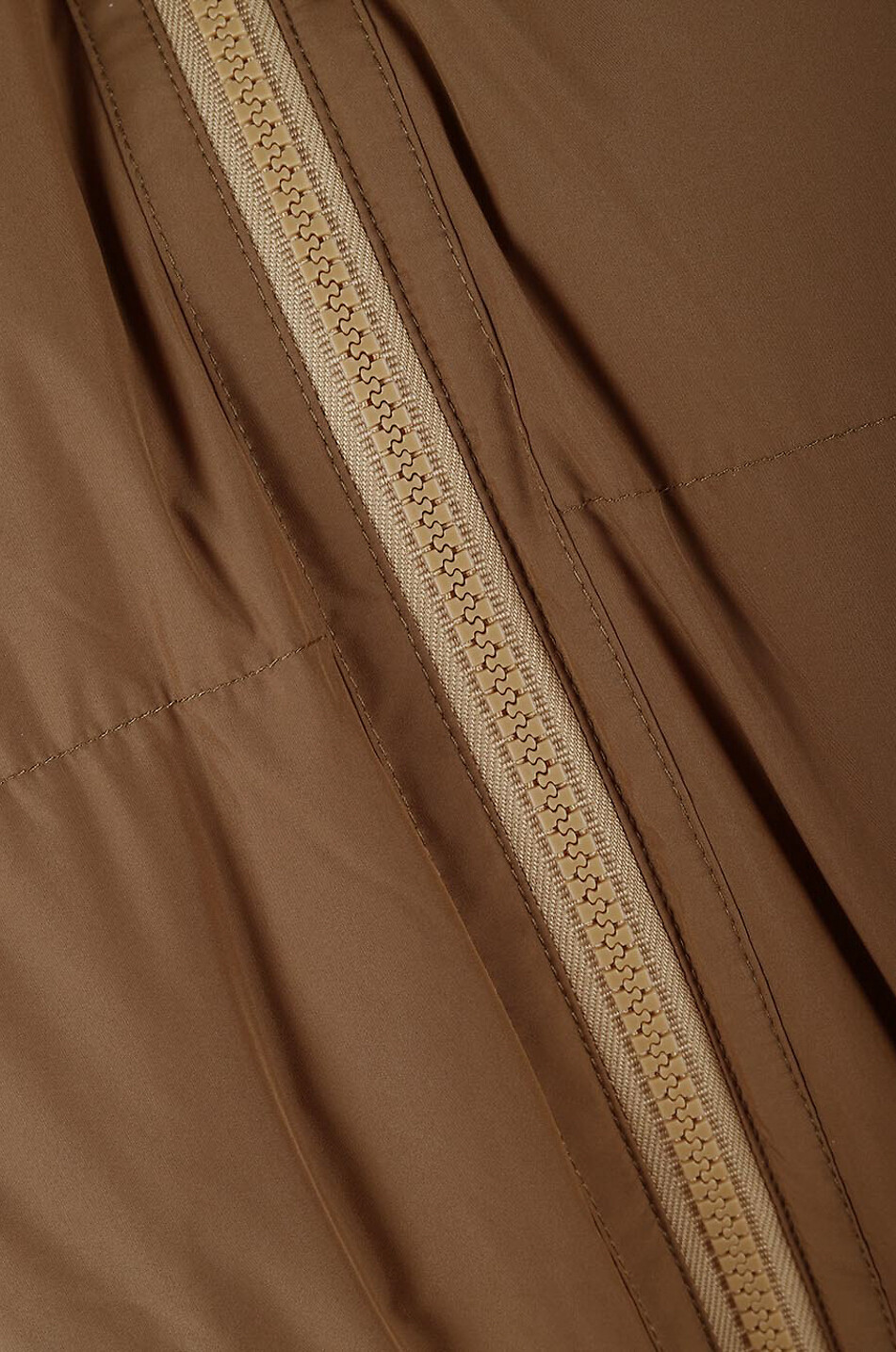 Gilet en duvet long garni de peau lainée