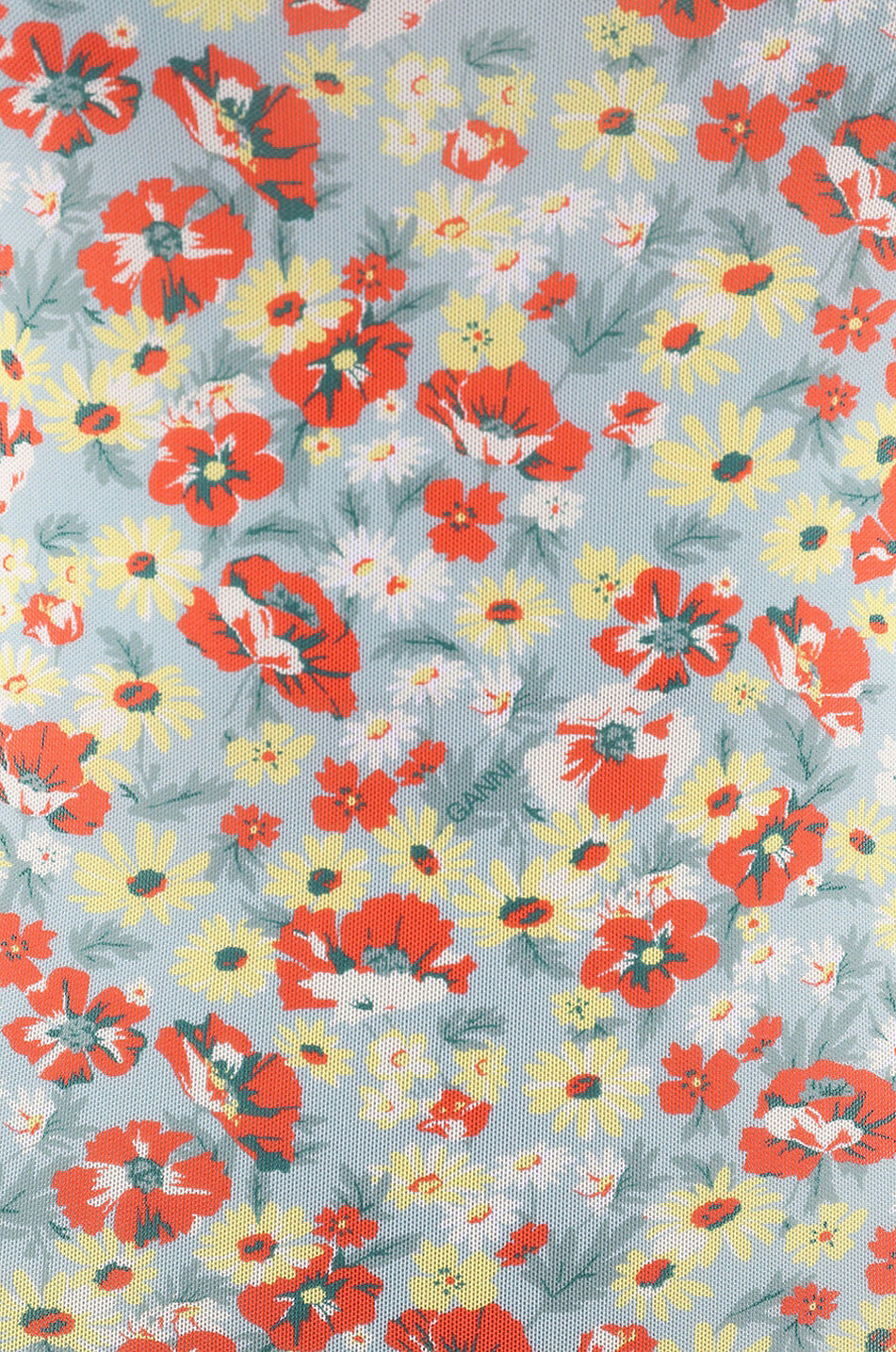 Top fleuri en mesh à col montant