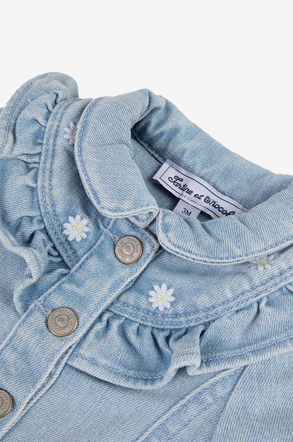 Ruffle and daisy adorned baby denim jacket