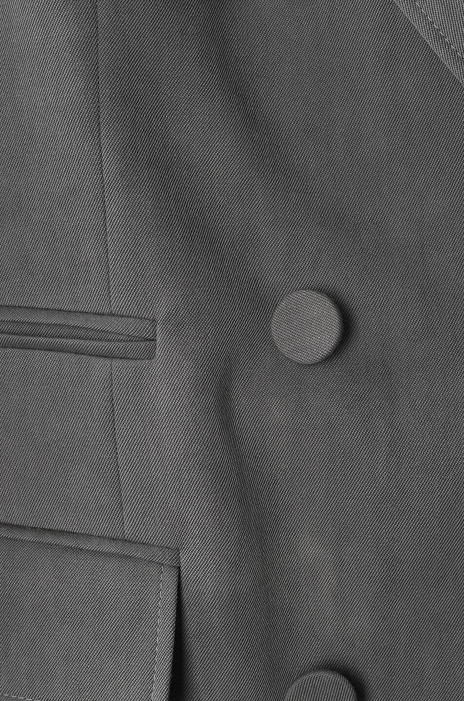 Blazer à boutonnage double en laine vierge à pattes
