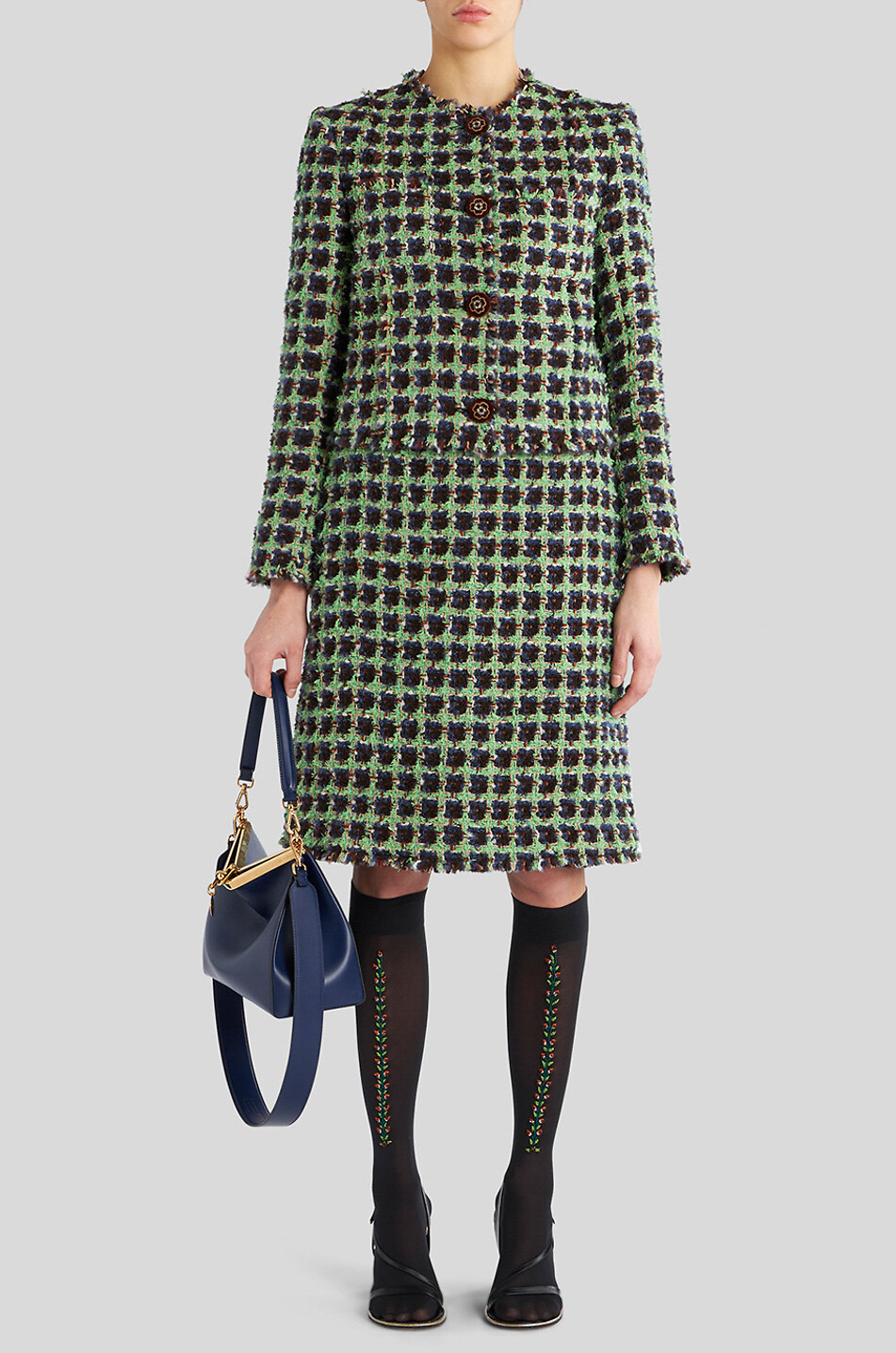 Veste en tweed à carreaux et boutons fleuris