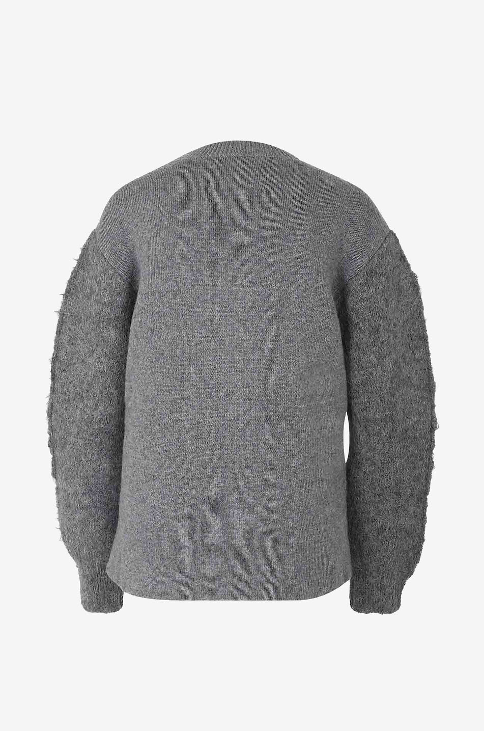 Bi-material jumper with rounded sleeves