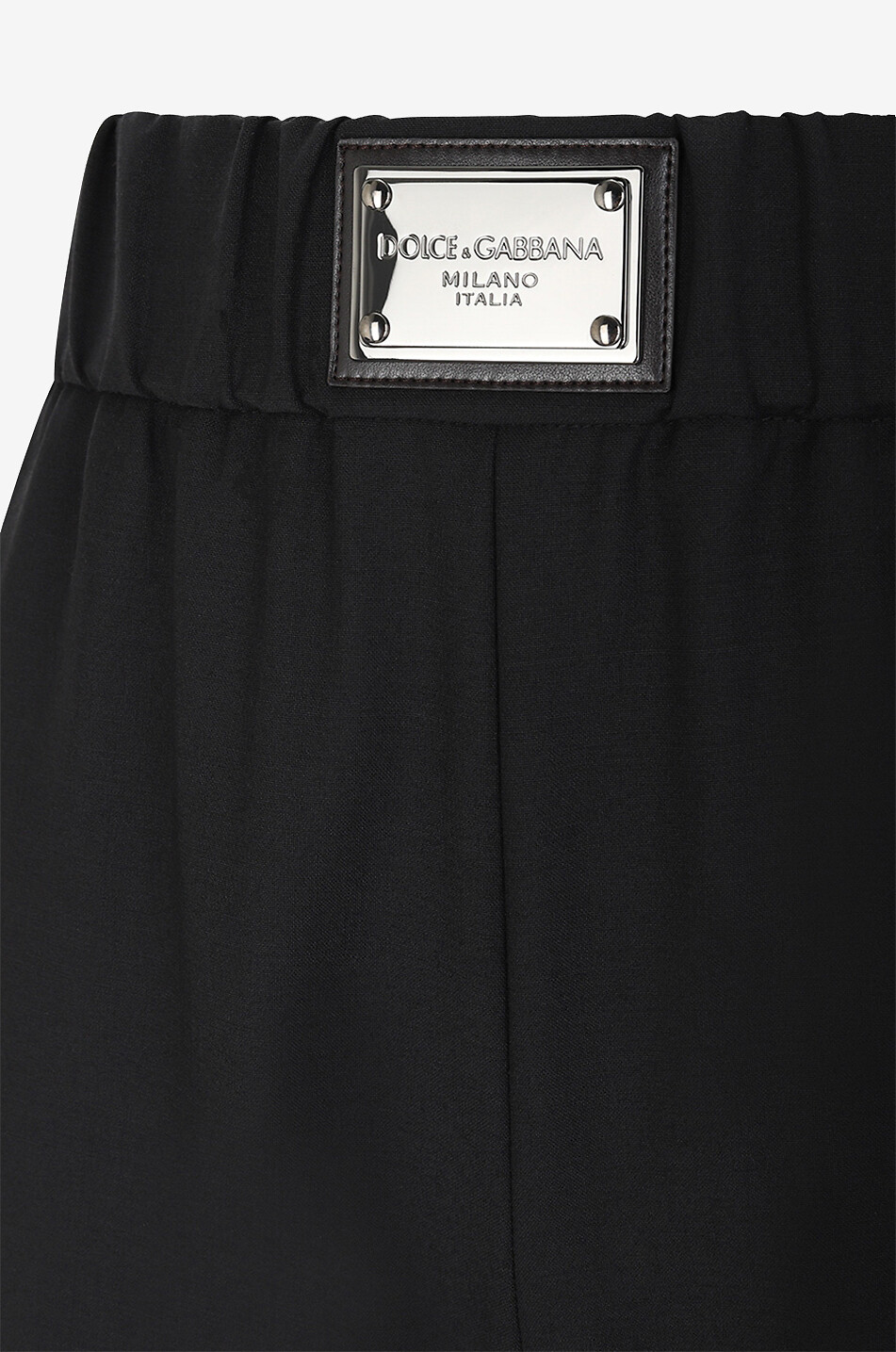 Logo plate adorned flared wool blend trousers