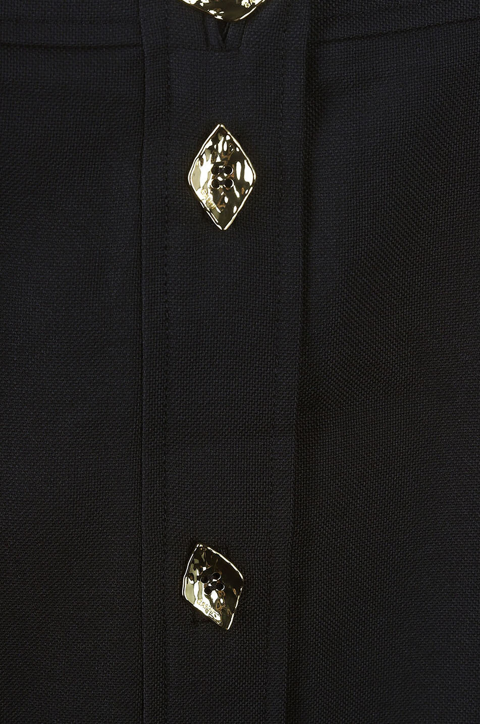 Minijupe trapèze à boutonnage asymétrique