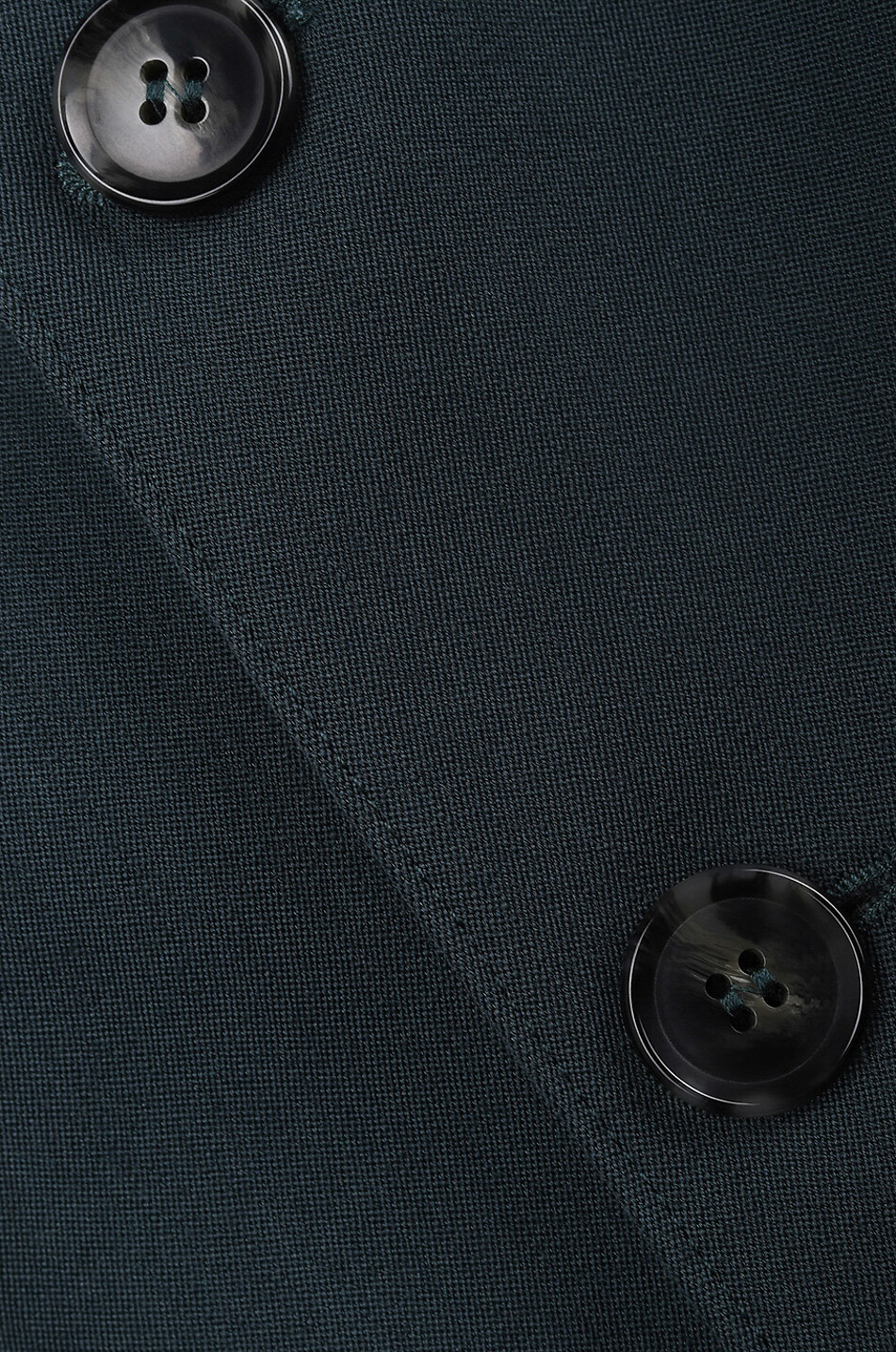 Blazer en laine vierge à boutonnage simple