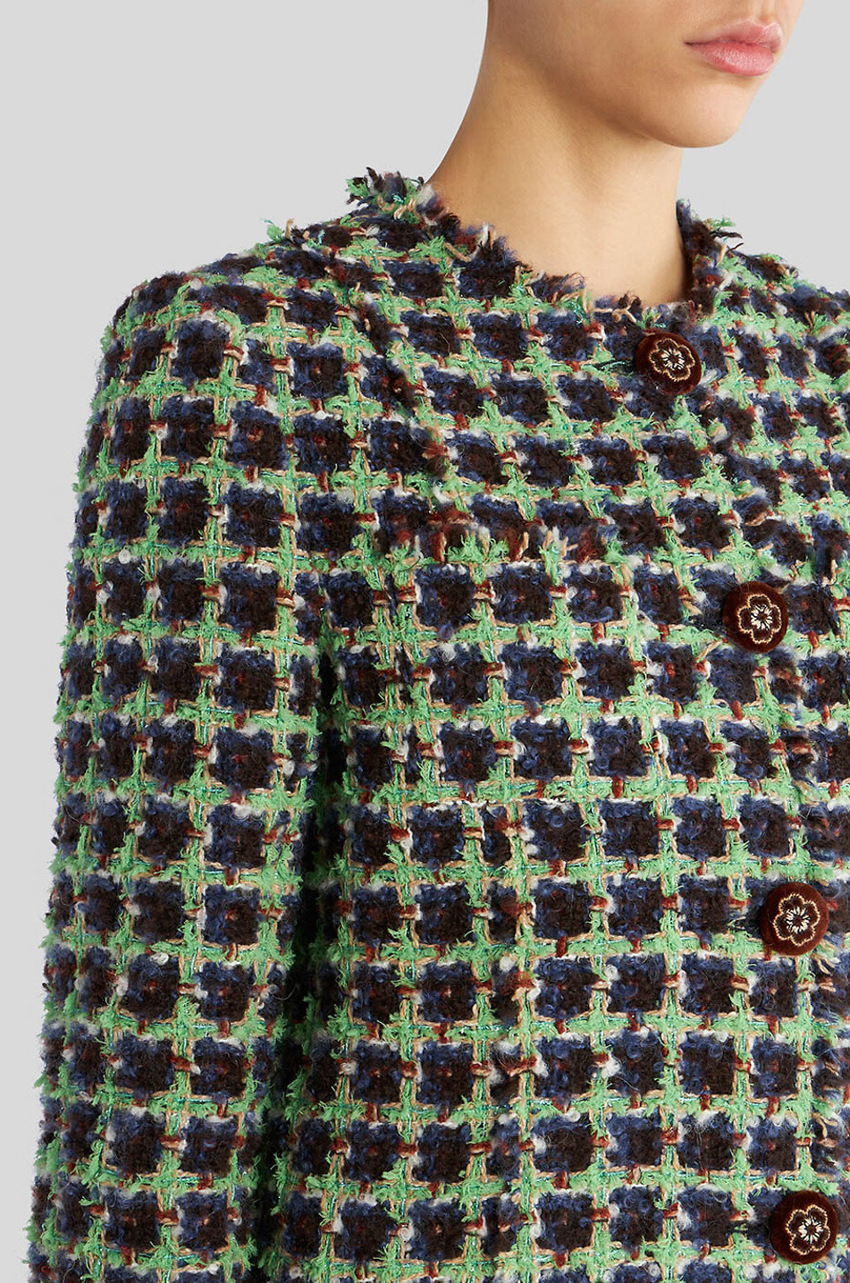 Veste en tweed à carreaux et boutons fleuris
