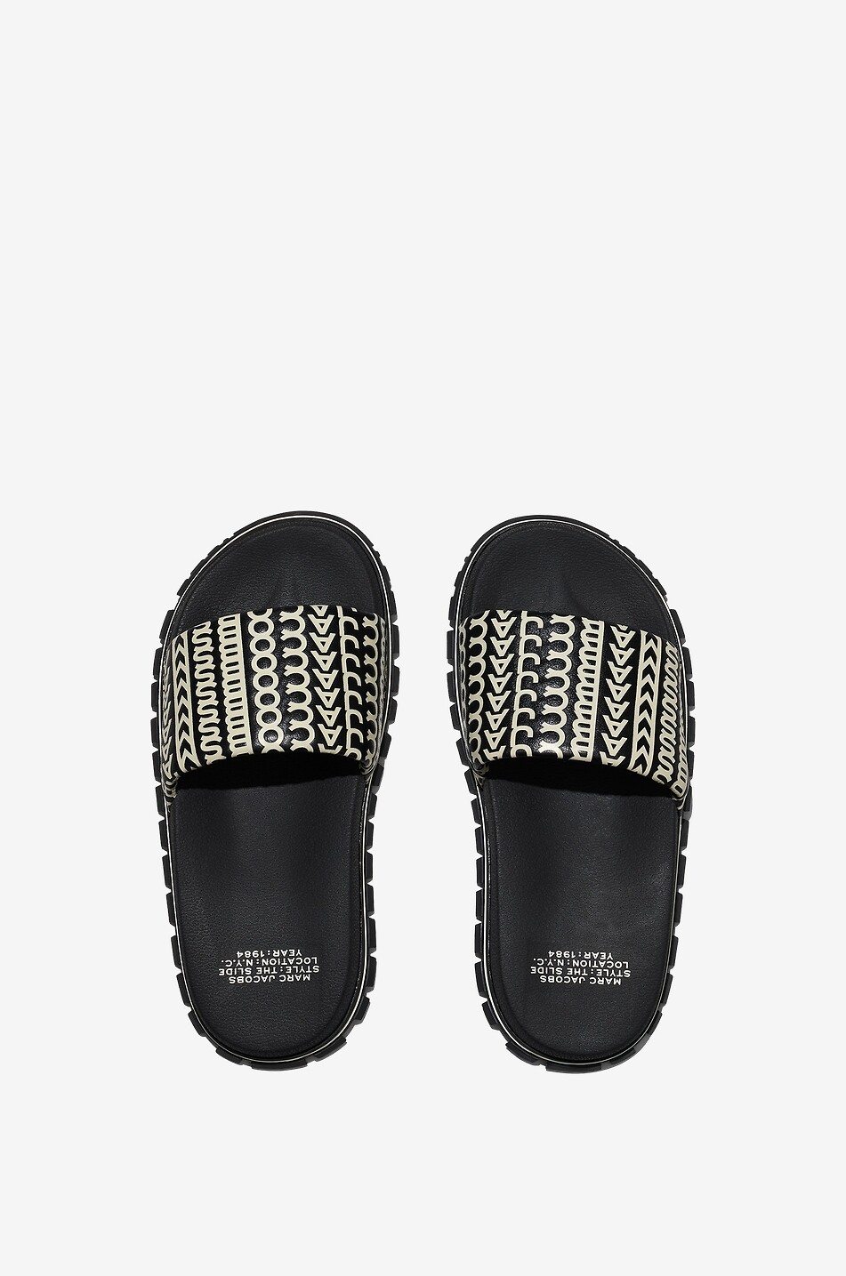 Flache Pantoletten aus Leder The Monogram Slide
