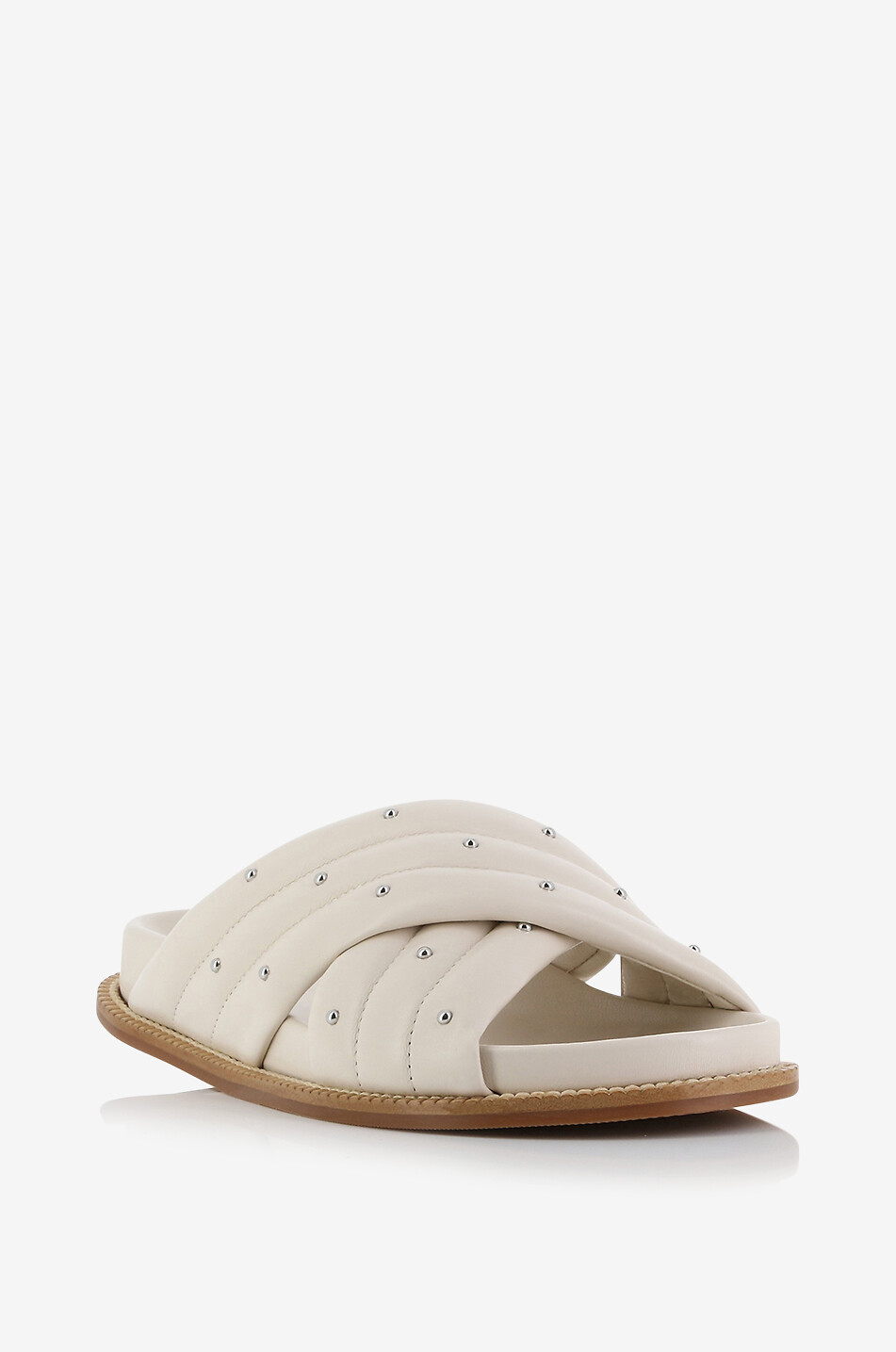 Mules plates en cuir lisse matelassé orné de clous