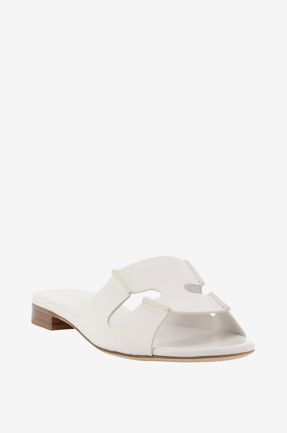 Mules plates en cuir Sellier