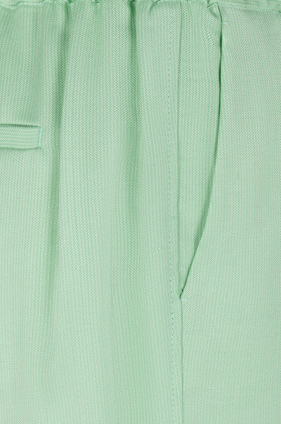 Pantalon carotte en tissu flammé