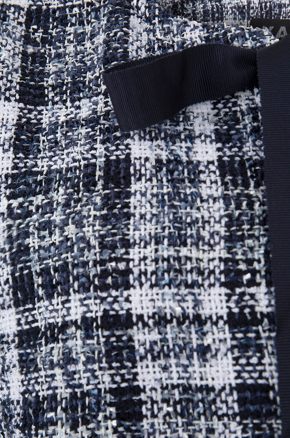 Veste à carreaux en tweed avec noeud