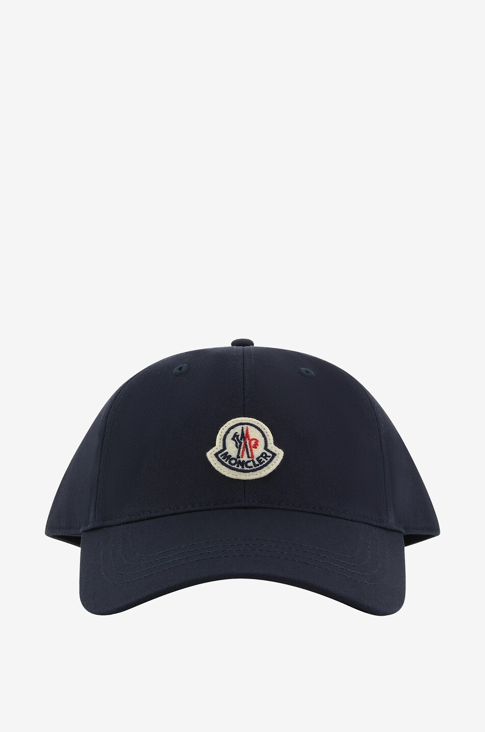 Tricolour ribbon and logo patch adorned baseball cap