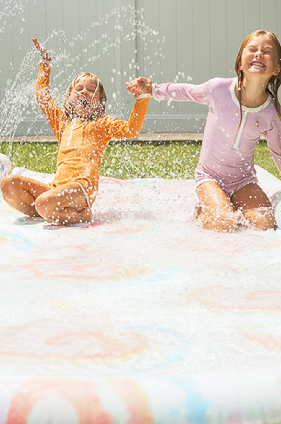 The Tie Dye inflatable slide and bodyboard set
