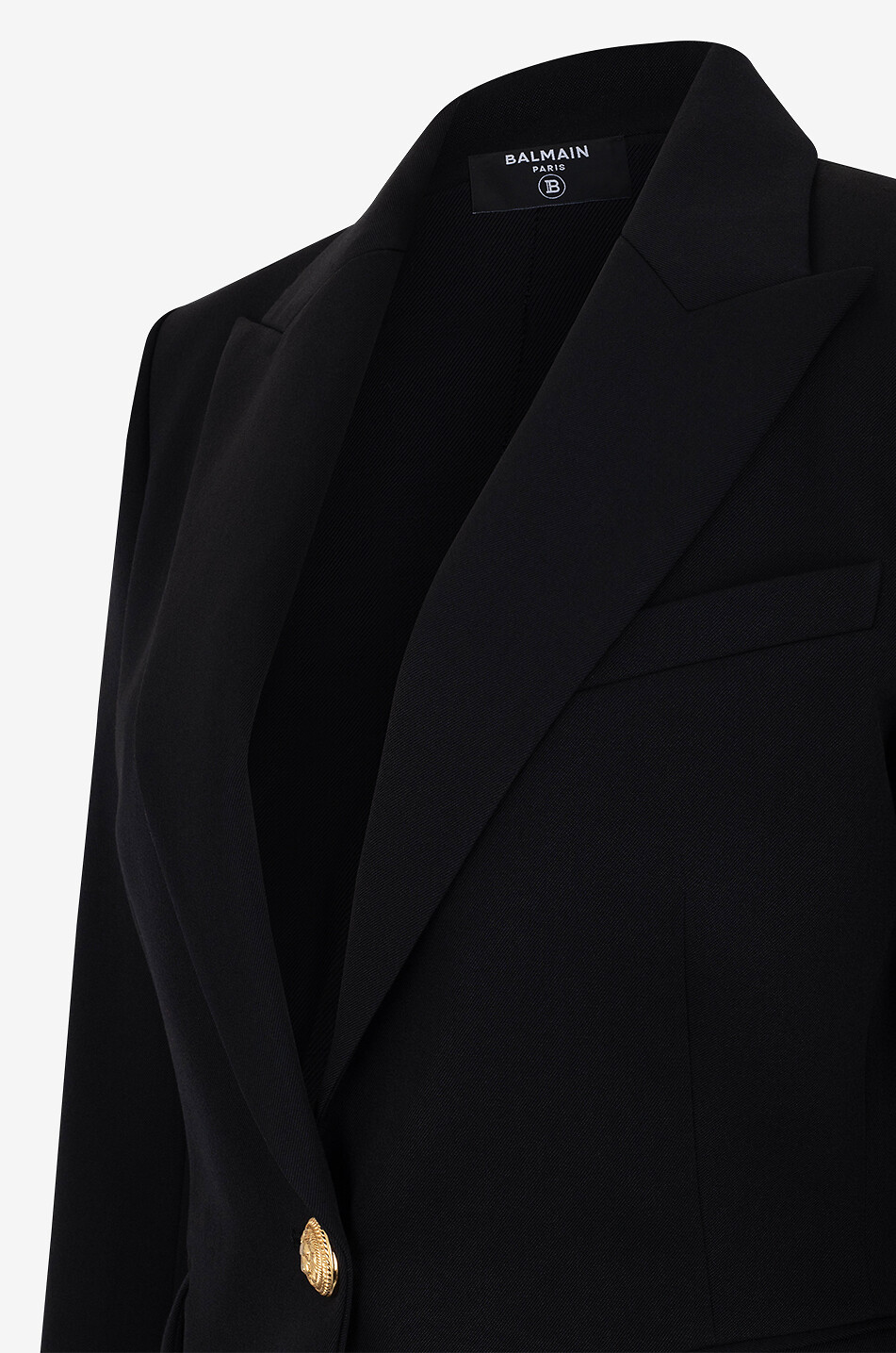 Blazer cintré en sergé de laine à boutonnage simple