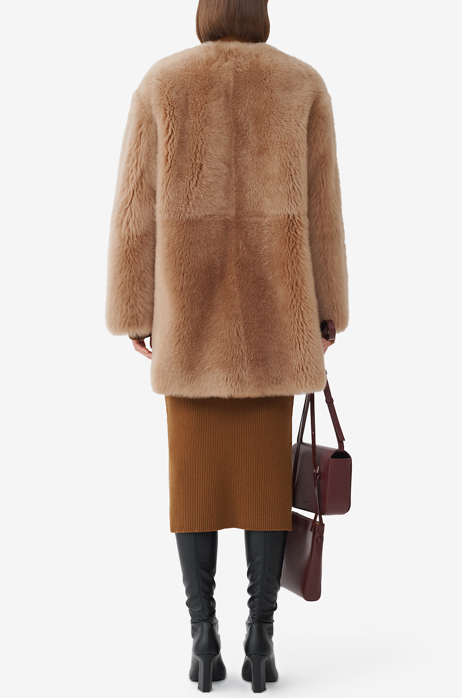Manteau en peau lainée à col rond
