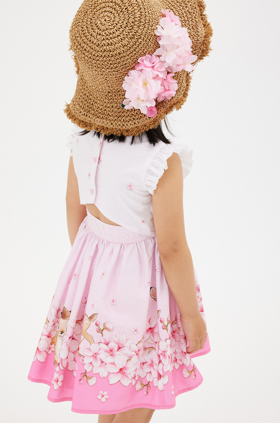 Blütenbesetzter Mädchen-Strohhut