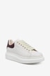Oversized smooth and grained leather low-top sneakers