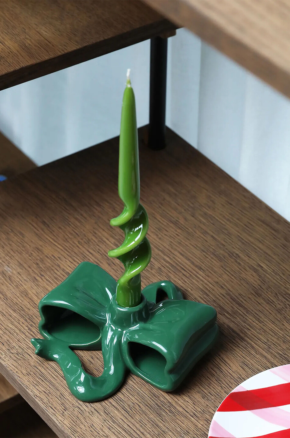 Ribbon enamelled taper-candle holder