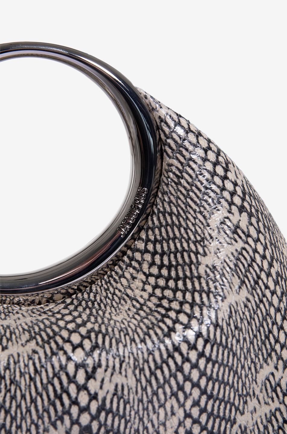 Handtasche aus Leder in Schlangenoptik Le petit Calino