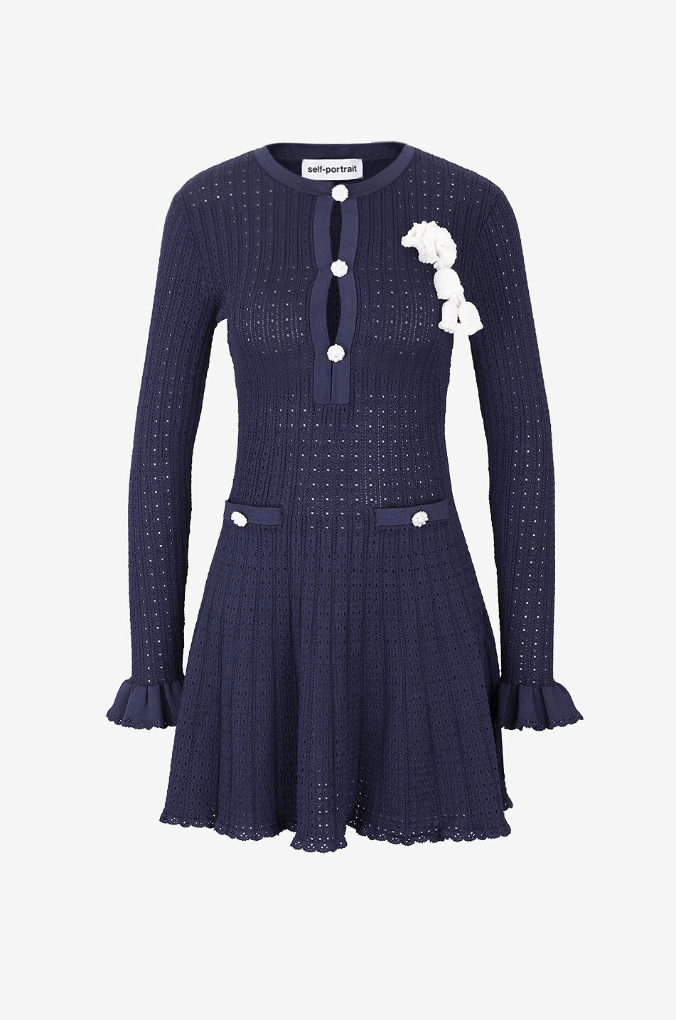 Mini pointelle knit dress with crochet brooch