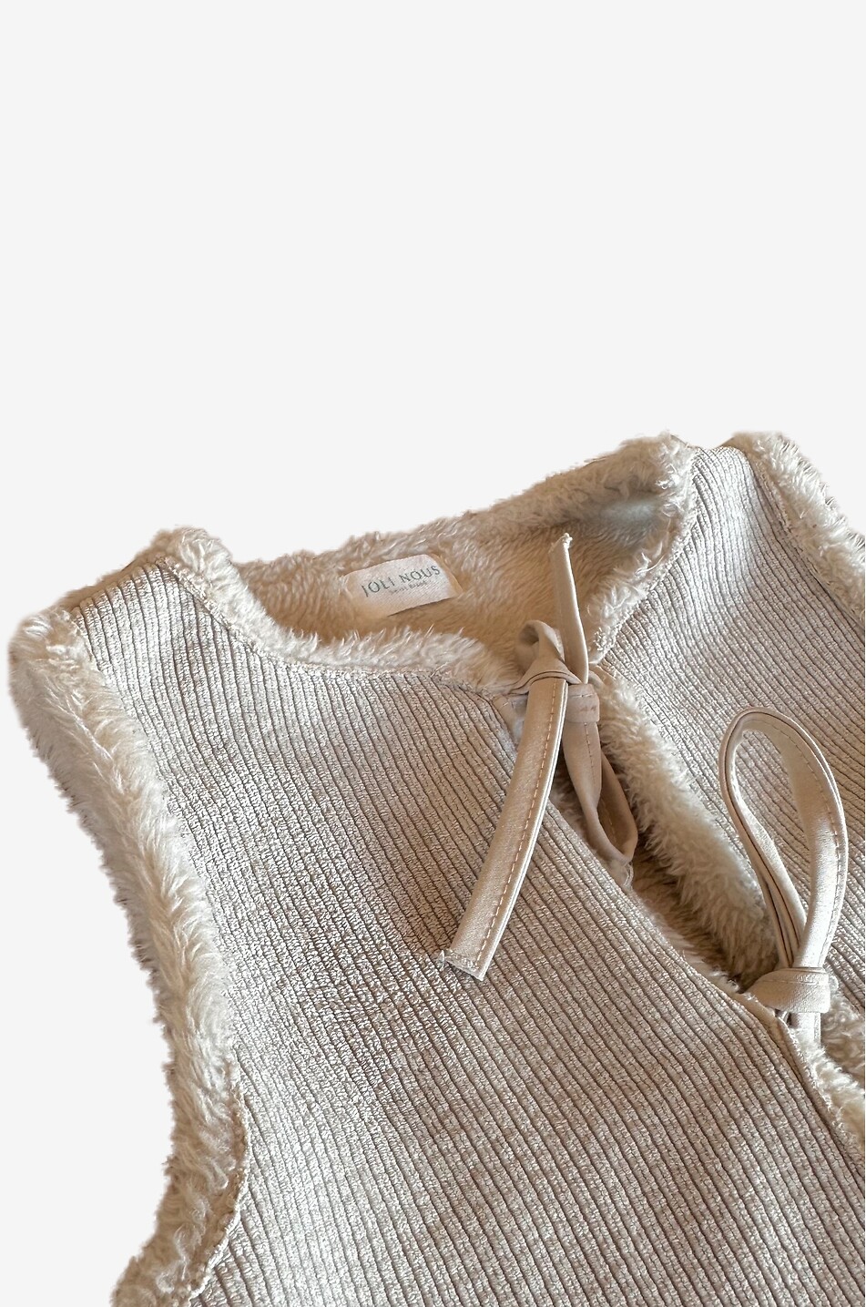 JOLI NOUS Reversibles Lammfell-Gilet für Baby Baby Hellbeige 3