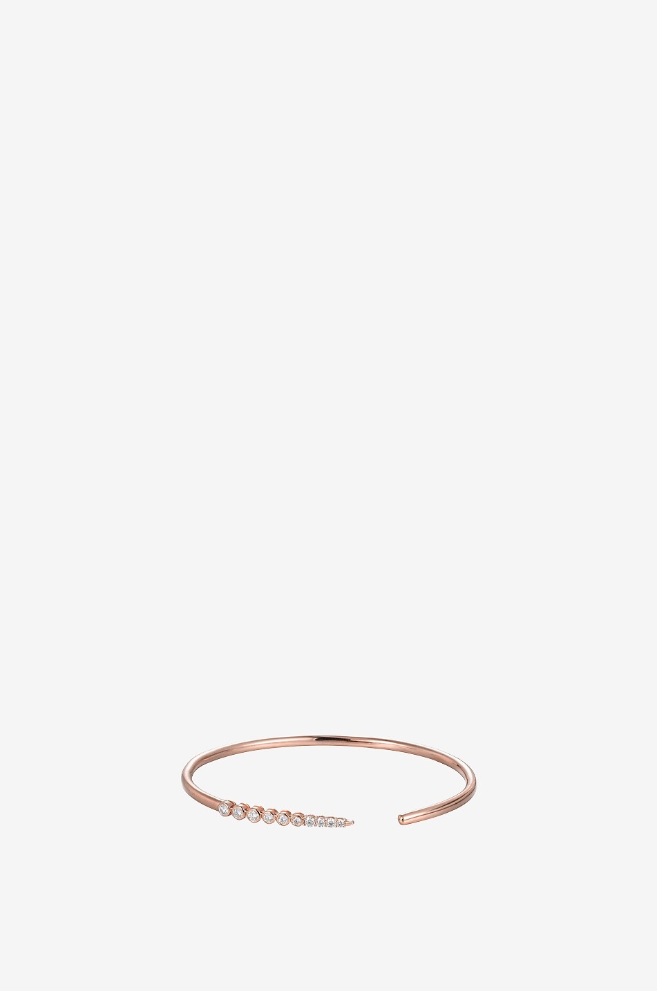 Snaky pink gold and diamond bangle